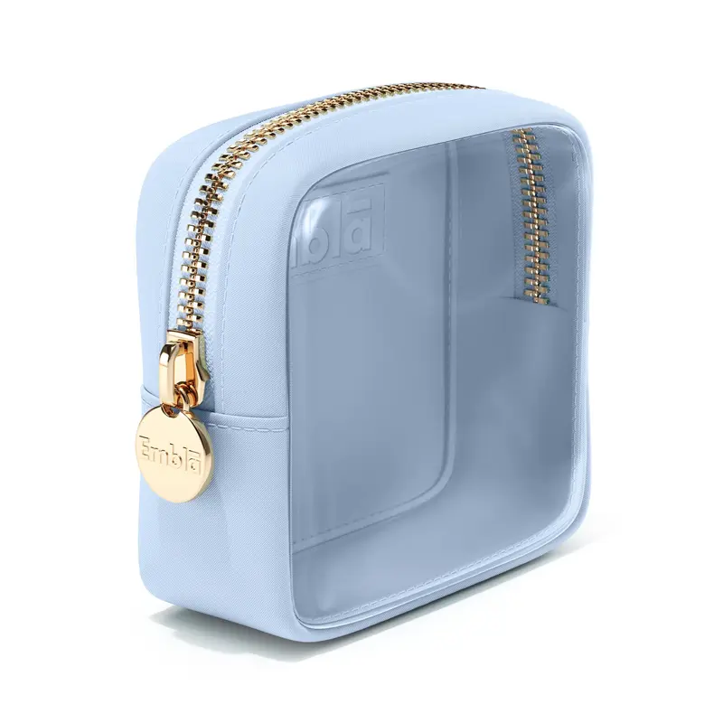 Embla London - Trousse à maquillage transparente bleu ciel | Vanity de voyage élégant